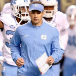 Larry Fedora jogs out
