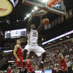 Florida State's Michael Ojo dunks against NC State