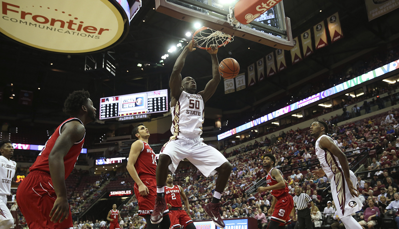 Florida State's Michael Ojo dunks against NC State