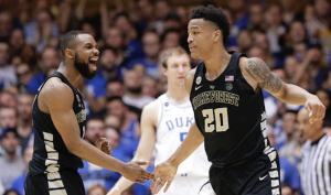 John Collins slaps hands