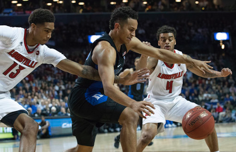 Frank Jackson fights for ball