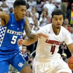Quentin Snider drives for Louisville basketball