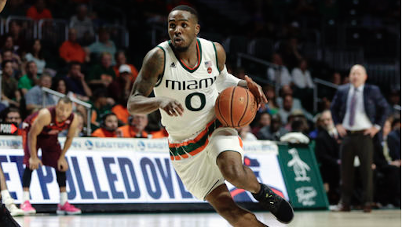 Ja'Quan Newton drives for Miami basketball
