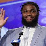 Christian Wilkins waves