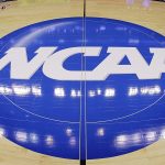 NCAA logo on basketball court