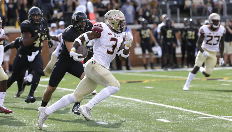 Cam Akers runs