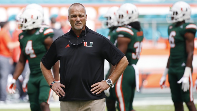 Mark Richt stands in front of his team