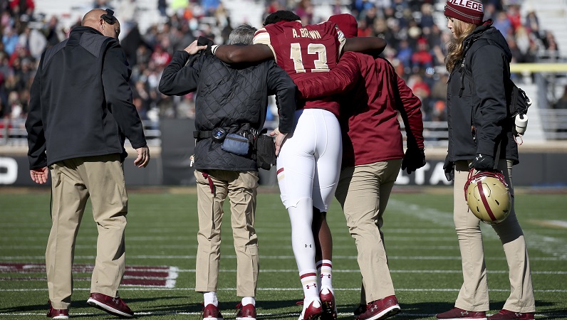Anthony Brown is helped off the field