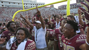 Willie Taggart and the Florida State Seminoles celebrate after a win