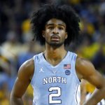 Coby White plays