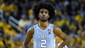 Coby White plays