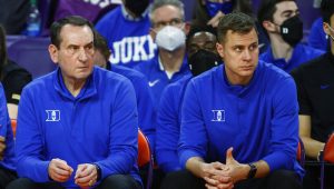 Coach K sits